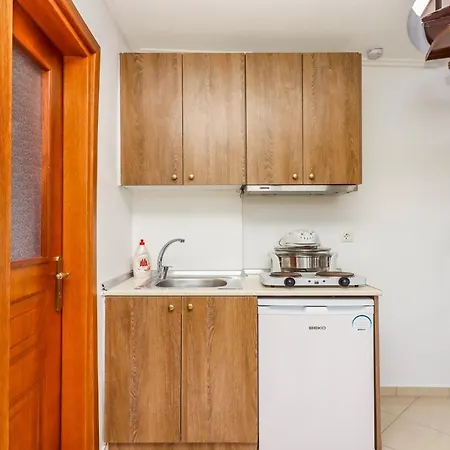 Acropolis With Parking Next To Center Seres