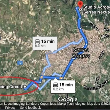 Acropolis With Parking Next To Center Seres