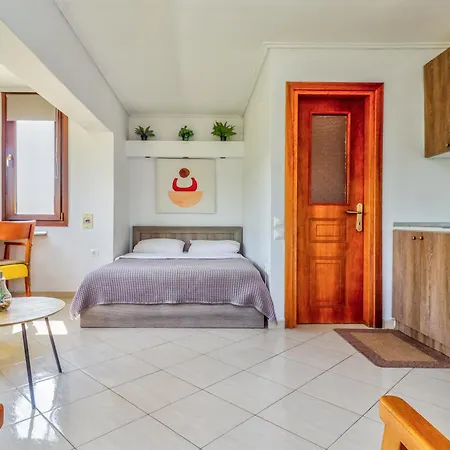 Acropolis With Parking Next To Center Seres